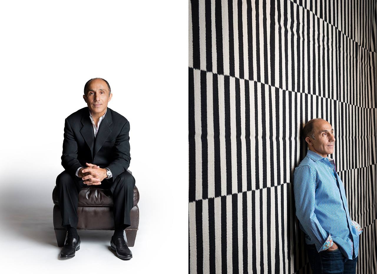 Man in suit against bold striped wall portrait