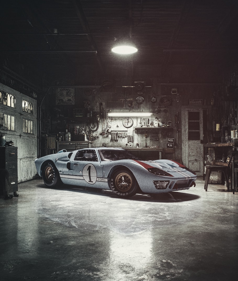 Vintage Ford GT40 race car in atmospheric industrial garage with moody lighting
